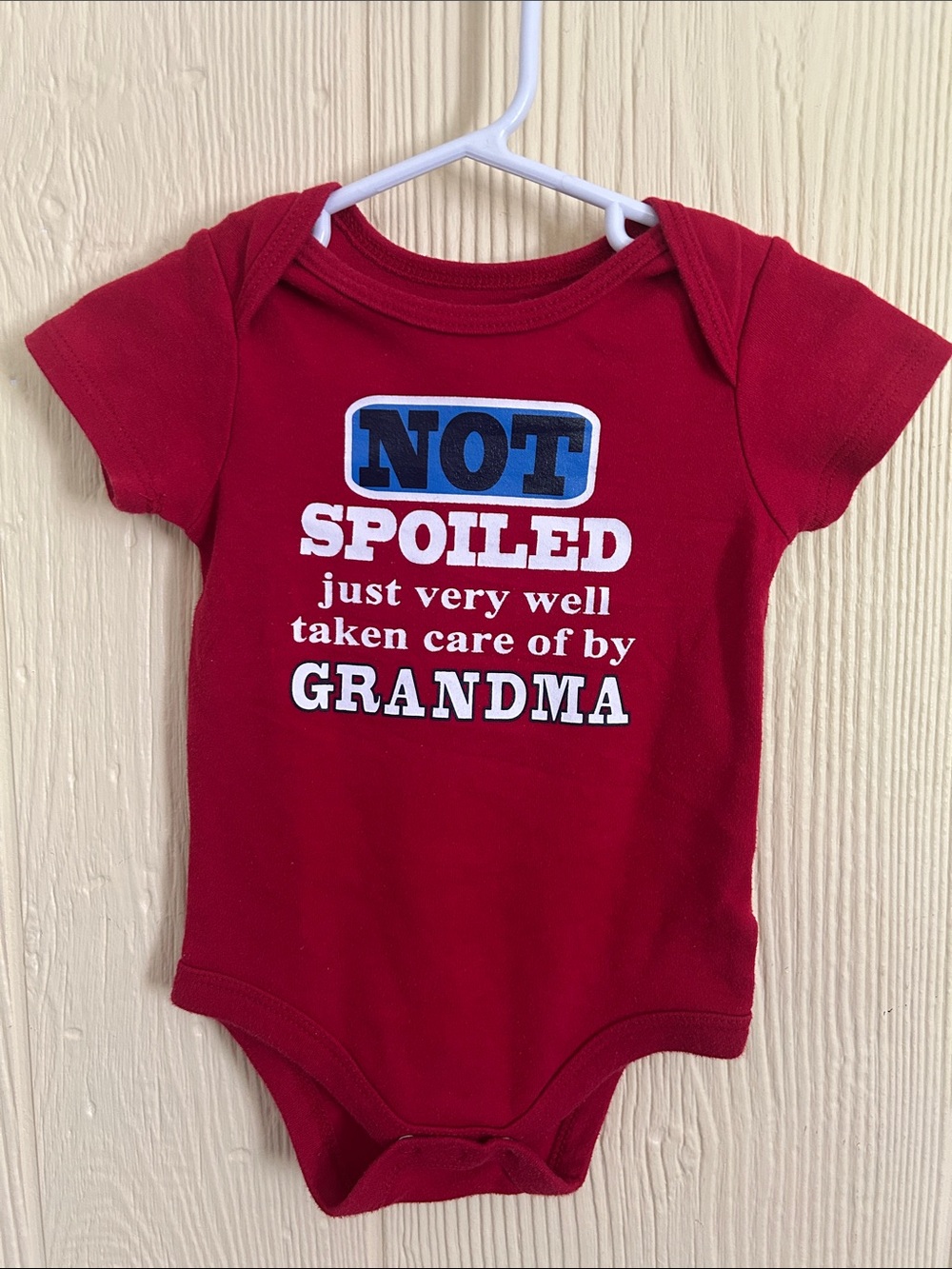 Baby Onesie with 'Not Spoiled' Grandma Graphic